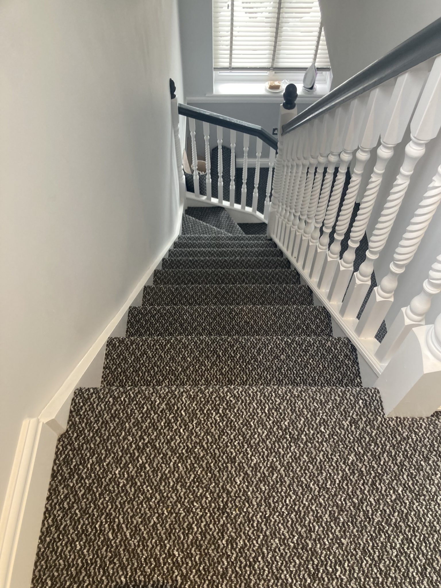 Patterned carpet professionally fitted to staircase by Strictly Floors